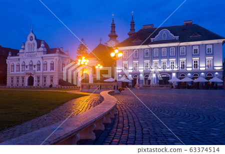 Unirii Square in Timisoara in dusk Unirii Square in Timisoara in dusk 63374514