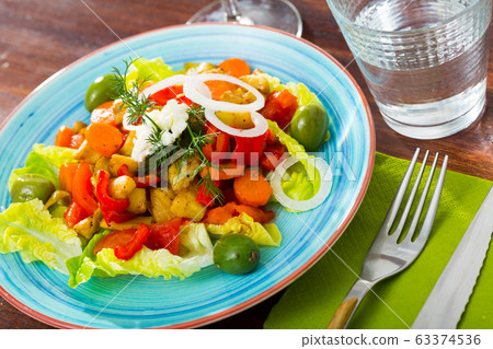 Warm salad with baked vegetables 63374536