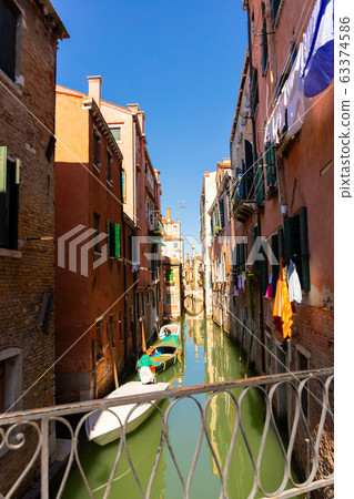 Venice with colorful buildings and canals, popular destination of Italy Venice with colorful buildings and canals, popular destination of Italy 63374586