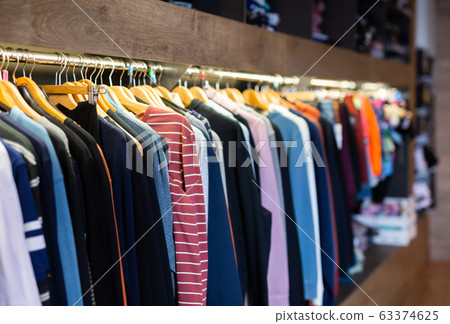 Different assortment of colorful clothing in boutique Different assortment of colorful clothing in boutique 63374625