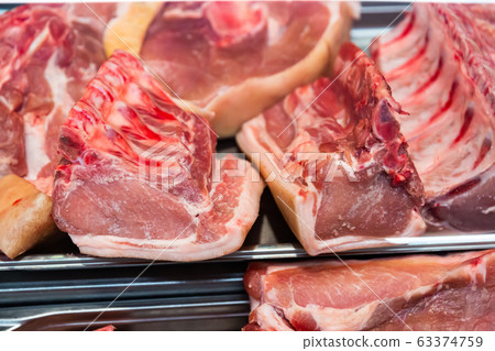 Meat showcase with fresh pork 63374759