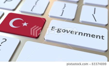 E-government or Electronic Government text and flag of Turkey on the keyboard. Modern public services related conceptual 3D rendering E-government or Electronic Government text and flag of Turkey on the keyboard. Modern public services related conceptual 3D rendering 63374899