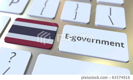 E-government or Electronic Government text and flag of Thailand on the keyboard. Modern public services related conceptual 3D rendering E-government or Electronic Government text and flag of Thailand on the keyboard. Modern public services related conceptual 3D rendering 63374918