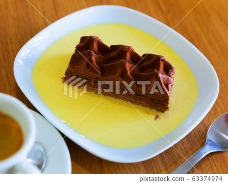 Piece of chocolate cake Piece of chocolate cake 63374974