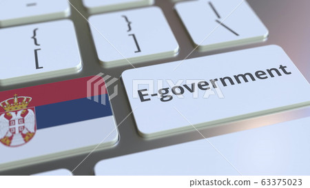 E-government or Electronic Government text and flag of Serbia on the keyboard. Modern public services related conceptual 3D rendering E-government or Electronic Government text and flag of Serbia on the keyboard. Modern public services related conceptual 3D rendering 63375023