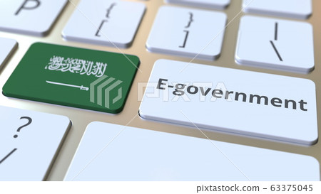 E-government or Electronic Government text and flag of Saudi Arabia on the keyboard. Modern public services related conceptual 3D rendering E-government or Electronic Government text and flag of Saudi Arabia on the keyboard. Modern public services related conceptual 3D rendering 63375045