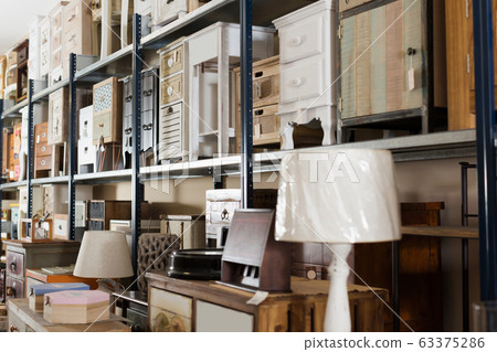 Image of old furniture assortment offered for sale Image of old furniture assortment offered for sale 63375286