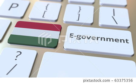 E-government or Electronic Government text and flag of Hungary on the keyboard. Modern public services related conceptual 3D rendering E-government or Electronic Government text and flag of Hungary on the keyboard. Modern public services related conceptual 3D rendering 63375356