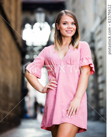 Girl walking in Barcelona streets Girl walking in Barcelona streets 63376612