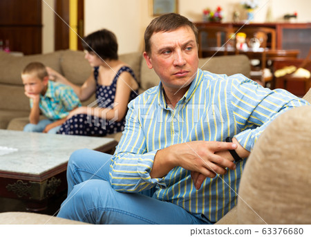 Man and her wife with son after quarrel Man and her wife with son after quarrel 63376680