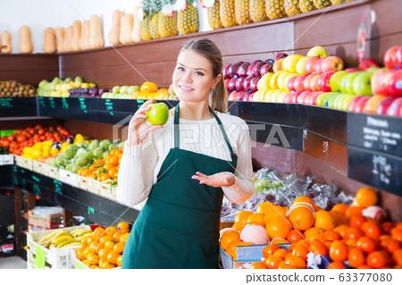 woman selling fresh apples and other fruits woman selling fresh apples and other fruits 63377080