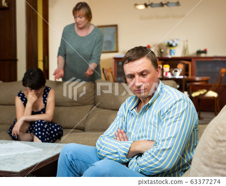Man and her wife after quarrel 63377274