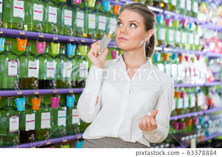 Woman looking for perfume 63378884