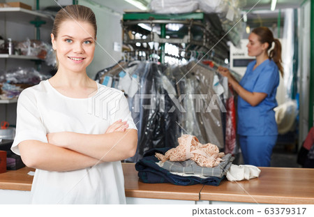 Satisfied client of dry cleaner Satisfied client of dry cleaner 63379317