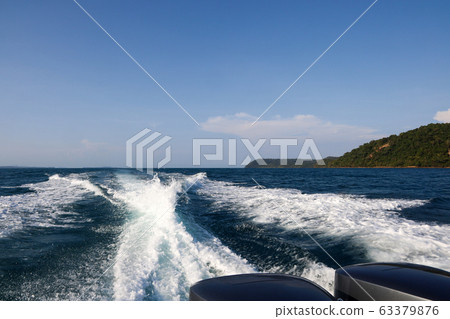 Blue sea view from the stern speedboat Blue sea view from the stern speedboat 63379876
