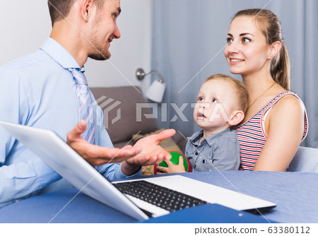 Worker of marketing company showing presentation 63380112