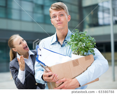 Angry businesswoman is chastising the employee Angry businesswoman is chastising the employee 63380788
