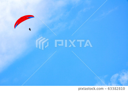 Clear skies and paragliding 63382810