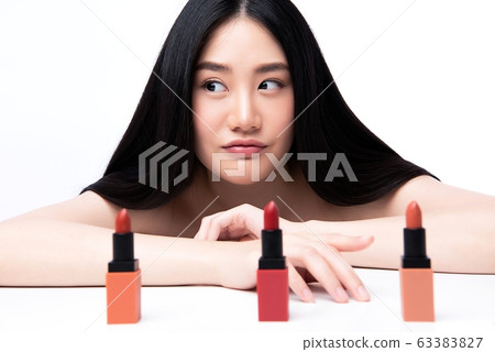 Young woman, beauty, makeup, lip, choosing, getting lost Young woman, beauty, makeup, lip, choosing, getting lost 63383827