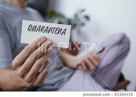 note with word quarantine in italian or catalan. note with word quarantine in italian or catalan. 63384359