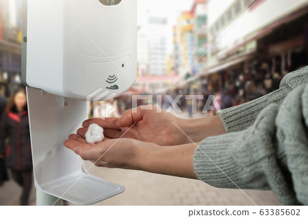 Disinfectant for hands in a public place during the coronavirus pandemic Disinfectant for hands in a public place during the coronavirus pandemic 63385602