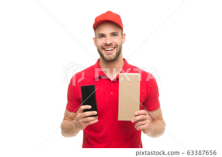 Delivering your purchase. Happy smiling man with 63387656