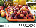 juicy nectarines on a tray in the market 63388920