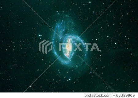 A green galaxy in deep space. Elements of this image were furnished by NASA. 63389909