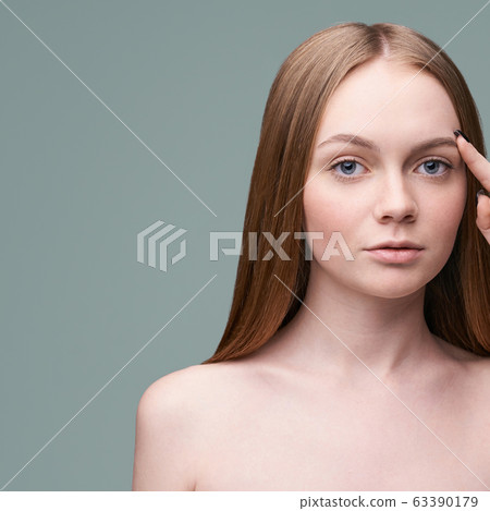 Young pretty woman studio portrait. Cosmetology concept 63390179