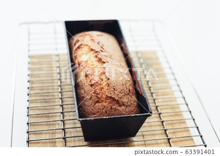 Organic bread in a baking pan. Selective focus shot 63391401