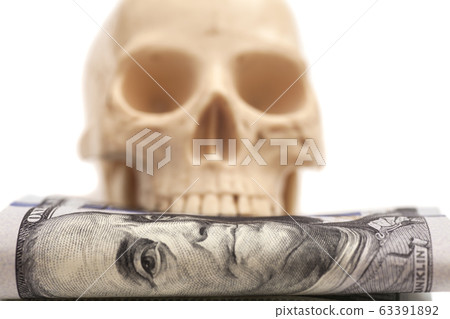 Hundred dollar bill with human skull isolated on Hundred dollar bill with human skull isolated on 63391892