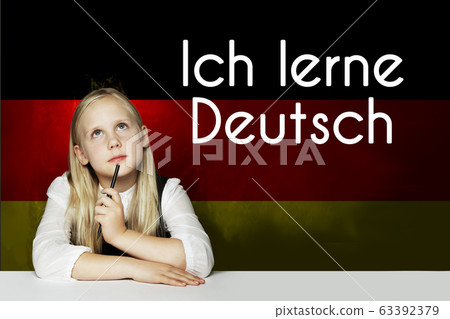 Thinking child girl student against the Germany Thinking child girl student against the Germany 63392379