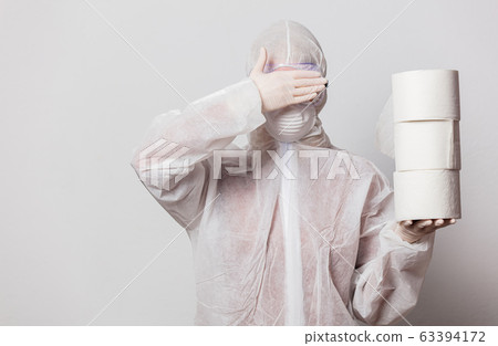 young doctor in protection suit and glasses with young doctor in protection suit and glasses with 63394172