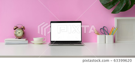 Close up view of feminine workspace with blank 63399620