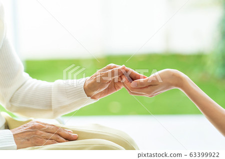 Nursing care wheelchair caregiver senior woman medical image 63399922