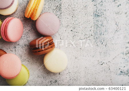 French macaroni cookies of different colors are on 63400121