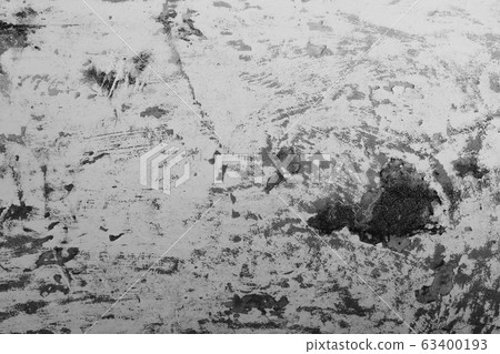 Close-up of White cement crack wall and peeled paint caused by water and sunlight. Peel wall of White house paint with black stain. Black and White of Texture background. Close-up of White cement crack wall and peeled paint caused by water and sunlight. Peel wall of White house paint with black stain. Black and White of Texture background. 63400193