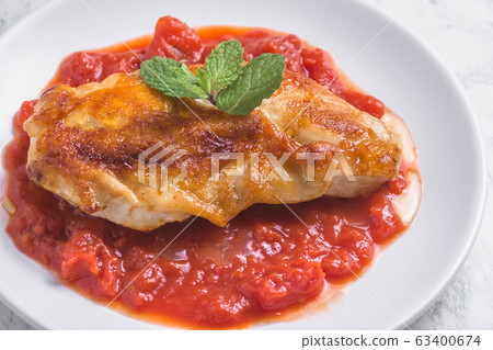 Sauteed chicken with tomato sauce Sauteed chicken with tomato sauce 63400674