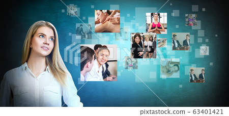 Business woman looks on images with her different hobbies. 63401421