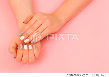 Delicate hands with natural manicure, clean skin. Delicate hands with natural manicure, clean skin. 63401620