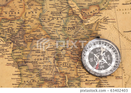 compass on vintage map compass on vintage map 63402403