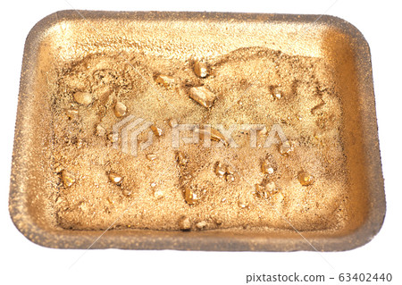 Golden nuggets on grungy wash pan with sand Golden nuggets on grungy wash pan with sand 63402440