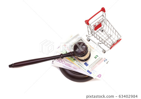 Hammer of judge, pushcart and euro money isolated 63402984