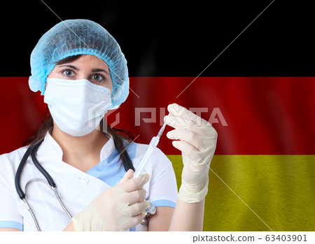 Scientist woman with test tube Coronavirus  63403901