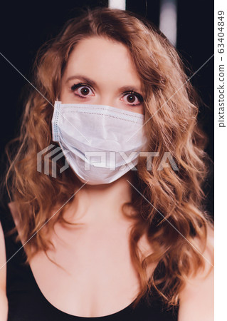 Woman suffer from cough with face mask protection. Woman suffer from cough with face mask protection. 63404849