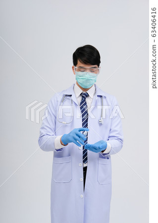 doctor physician practitioner with hand washing 63406416