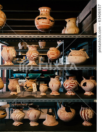 Ancient pottery at Archeologist workshop in Ban Chiang Museum 63406937
