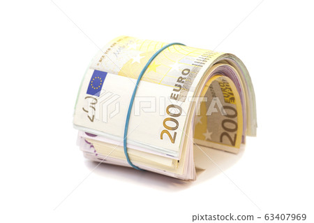 Twenty hundredth banknotes under rubber band 63407969