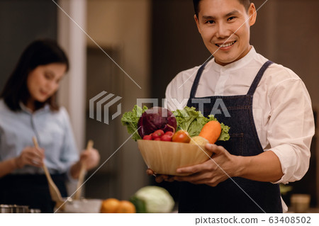 a Smiling Man with the Bowl of Fresh Vegetables, a Smiling Man with the Bowl of Fresh Vegetables, 63408502