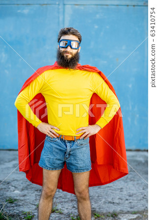 Superman portrait on the blue background Superman portrait on the blue background 63410754